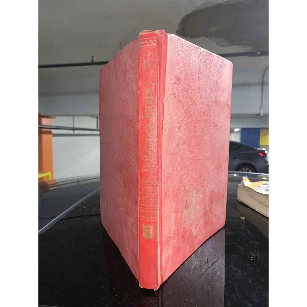 Volume 7 (H) of the vintage red and gold Britannica Junior Encyclopædia